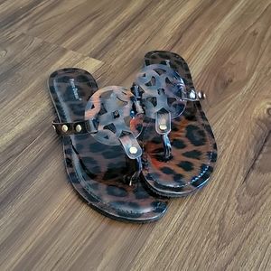 Iridescent animal print flip flops